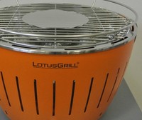 LotusGrill der rauchfreie Holzkohlegrill Orange wie neu incl.Zubehör-Set