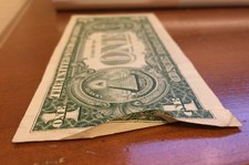 Series 1985 $1 Triple Printed-Over Folds Error Note (0065B)