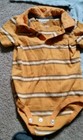 Oshkosh orange strip short sleeve polo onsie size 24 months