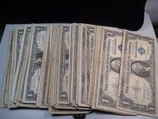 68 Us 1957 Silver Certificate Blue seal notes. Ave circulation.