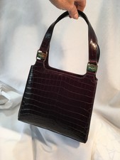 New listing
Black Ferragamo Alligator convertible Vintage Handbag