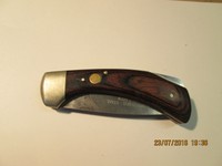 Jul. Herbertz Klappmesser. Damaszener Stahl, 49 Lagen. Griff aus Wurzelholz.