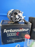 AMBASSADEUR (ABU Garcia) 5000C - FROM 3/1973 IN A BOX WITH A CASE ETC.