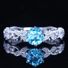 Sterling silver blue topaz wedding rings