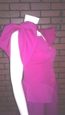 Vintage 80s pink party dress with bows and peplum