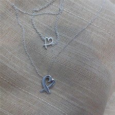 sterling silver Tiffany & co. heart pendant on chain matching bracelet  2314  25