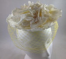 New listing
Vintage Ladies Hat Headpiece Ivory Colored Flowers with Yellow Veil Netting