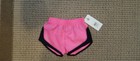 Under Armour LITTLE girls shorts pink and black 18m