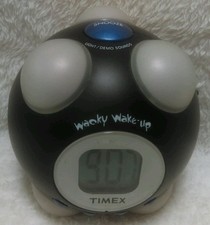TIMEX SHAKE N WAKE WACKY WAKE - UP ALARM CLOCK 7 WACKY PHRASES TO WAKE UP TO