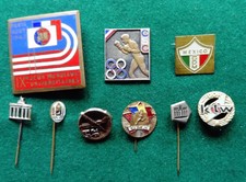 9 assorted sport and general pin badges