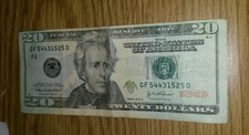 Miscut twenty dollar bill currency