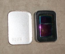 Zippo Lighter in original tin with guarantee, Ford iridescent   