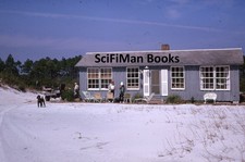 Kodachrome 35mm Slide White Sand Beach Cabin House People Poodle Dog Chairs 1964