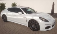 Gutschein - 1 Tag (24h) Porsche Panamera mieten inkl. 100 Freikilometer 