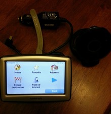 Tom Tom Xl Gps N14644 w/ car charger and suction base