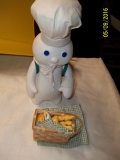 Pillsbury DoughboyCeramic 10" Figure/Backpack,Picnic Basket. .Arms movable .