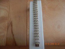 Rembrant yellow gold filled triple row link bracelet w twisted wire, 8 1/2" long