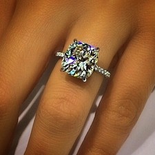 Cushion cut engagement rings with pave setting